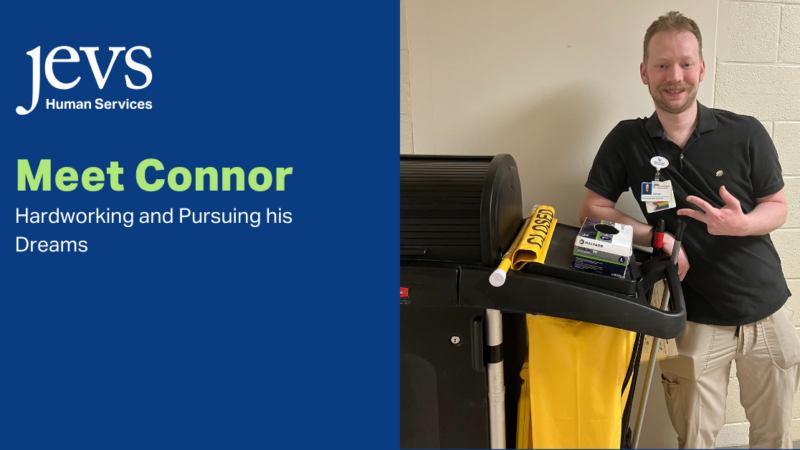 Image description. Jevs Logo in white font against navy blue background. Text in green font below logo that reads Meet Connor; hardworking and pursuing dreams. Image of Connor on right side of image. End Description.