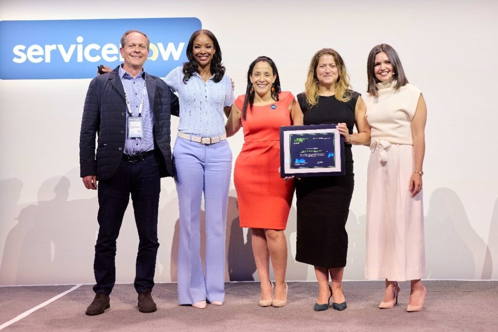 L-R: David Kanter, Accenture’s ServiceNow Business Group Leader; Vanessa Smith, ServiceNow.org President; Ana Ramos-Hernandez, JEVS Senior Vice President of Technology; Cynthia Figueroa, JEVS President & CEO; and Lyndsay Harris-Kyei, ESG Social Strategy Senior Director, on stage at the ServiceNow conference in Las Vegas . 